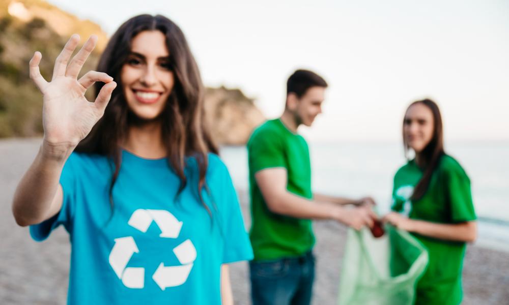 group-volunteers-collecting-trash-beach
